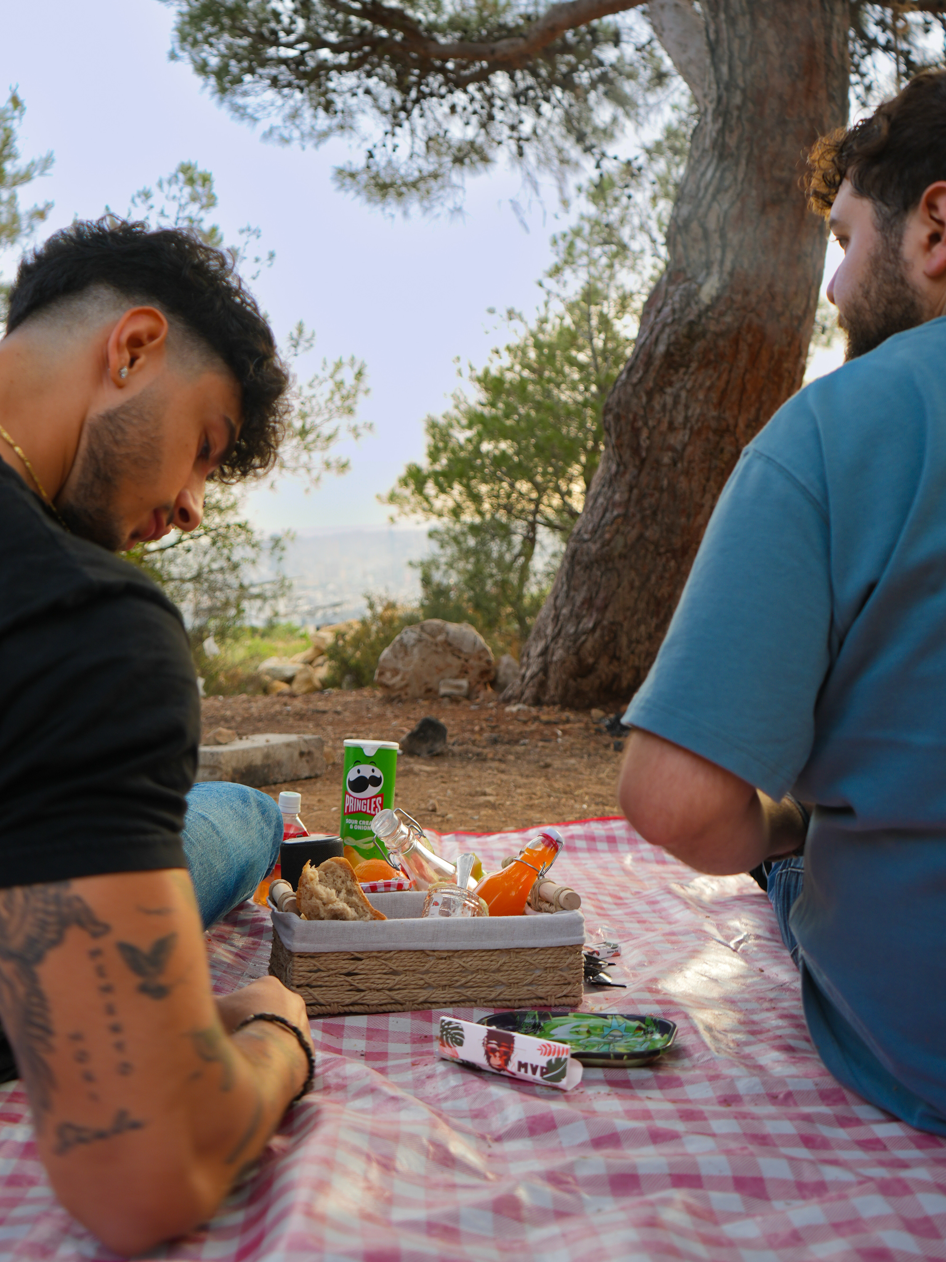 Friends gathered outdoors with MVP papers